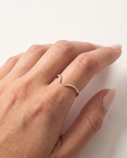 Lyra Ring in gold worn on hand